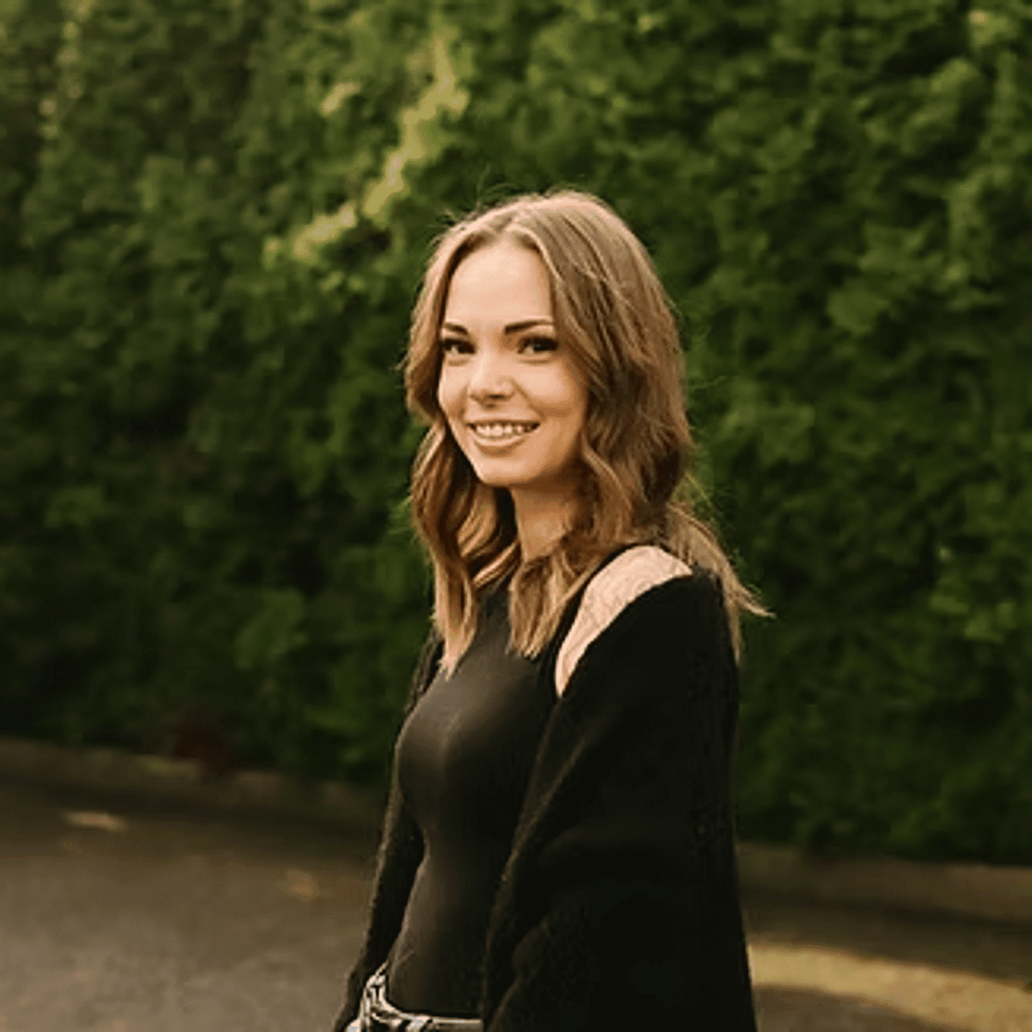 Portrait of Jayme Knight, a professional stylist at Beautique Beauty Lounge, showcasing their expertise and style.