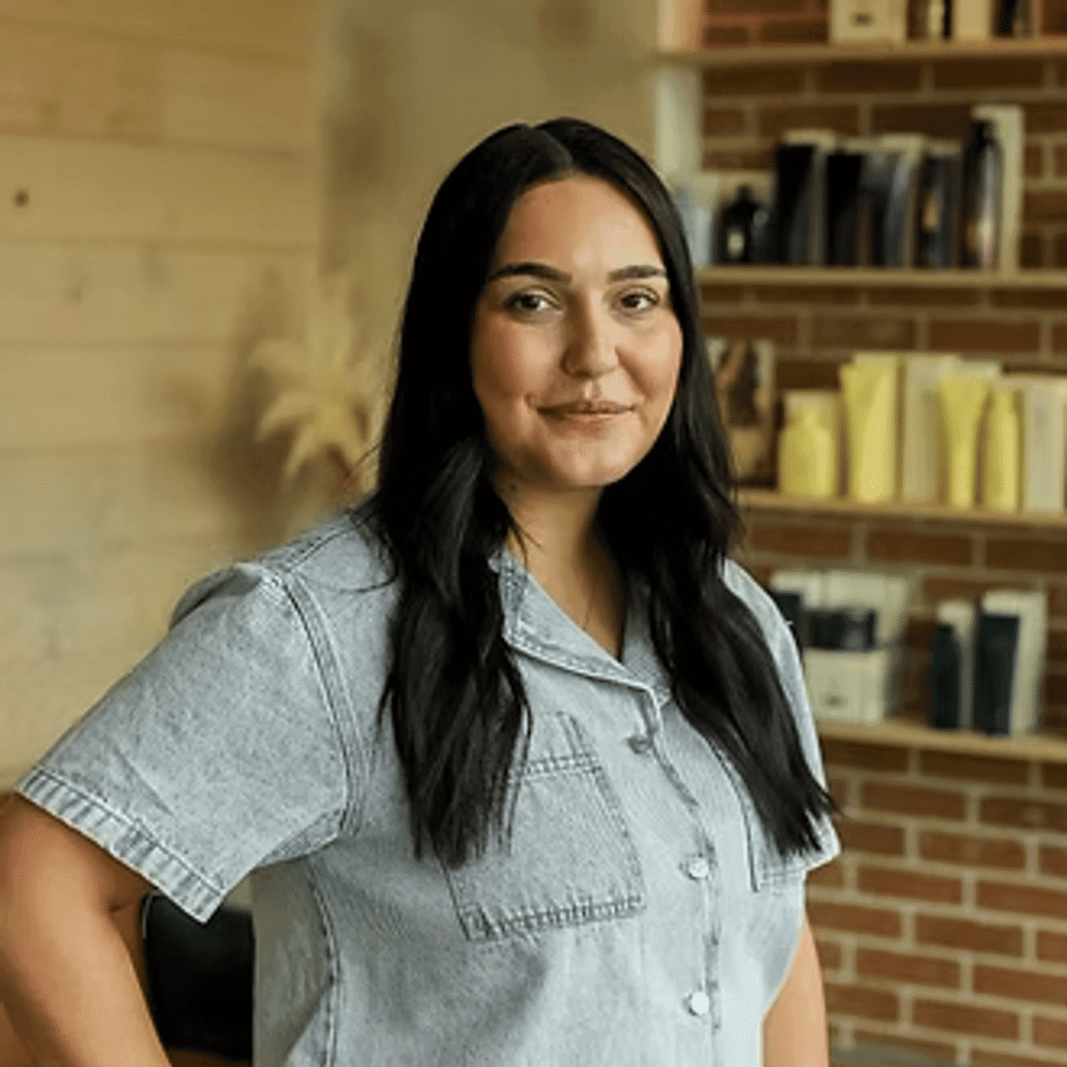 Portrait of Victoria Rognon, a professional stylist at Beautique Beauty Lounge, showcasing their expertise and style.