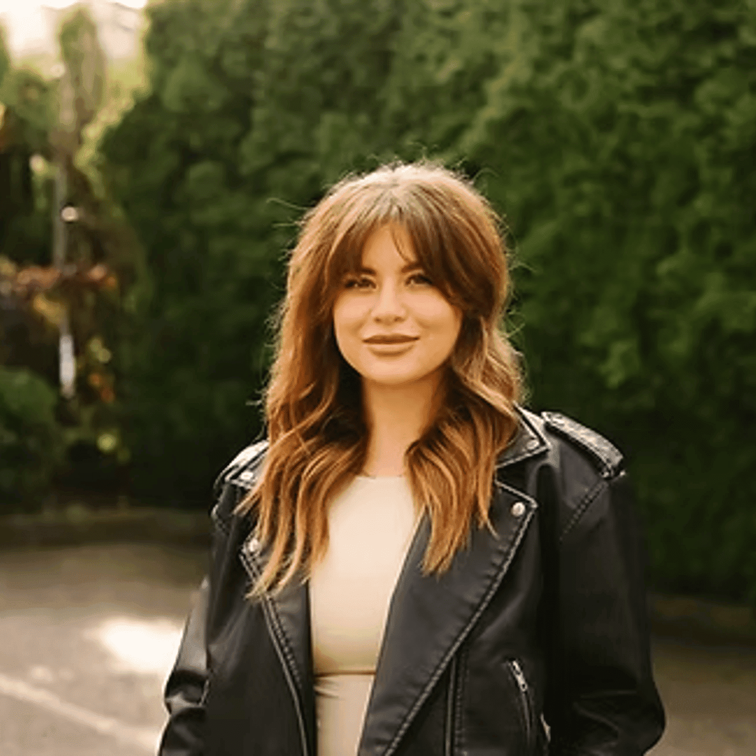 Portrait of Courtney Thomas, a professional stylist at Beautique Beauty Lounge, showcasing their expertise and style.