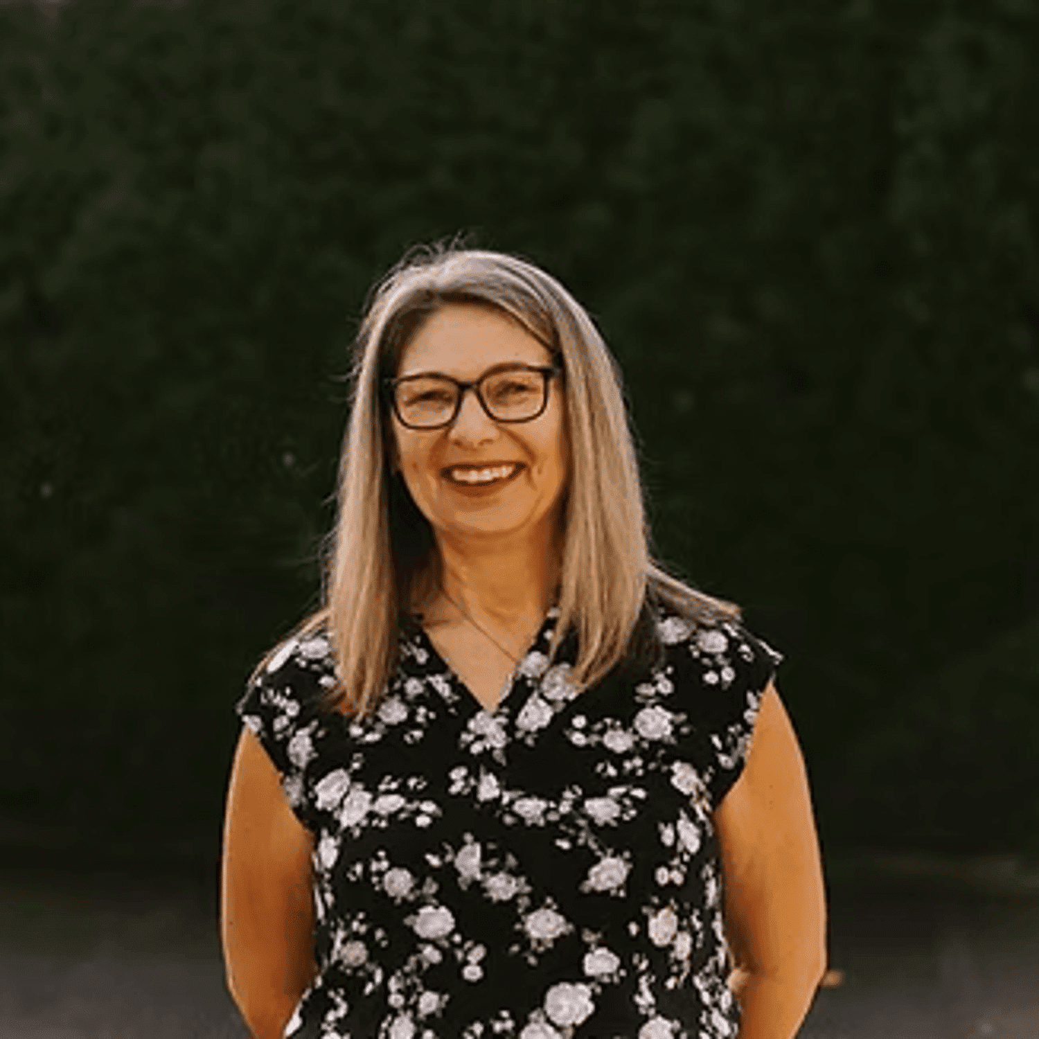 Portrait of Maria Defauw, a professional stylist at Beautique Beauty Lounge, showcasing their expertise and style.