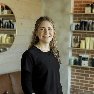 Portrait of Jenna Beukema, a professional stylist at Beautique Beauty Lounge, showcasing their expertise and style.