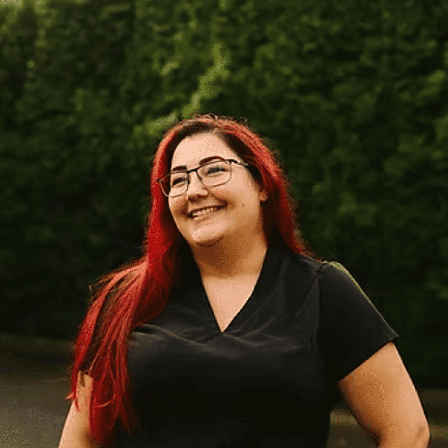 Portrait of Nicole Stewart, a professional stylist at Beautique Beauty Lounge, showcasing their expertise and style.